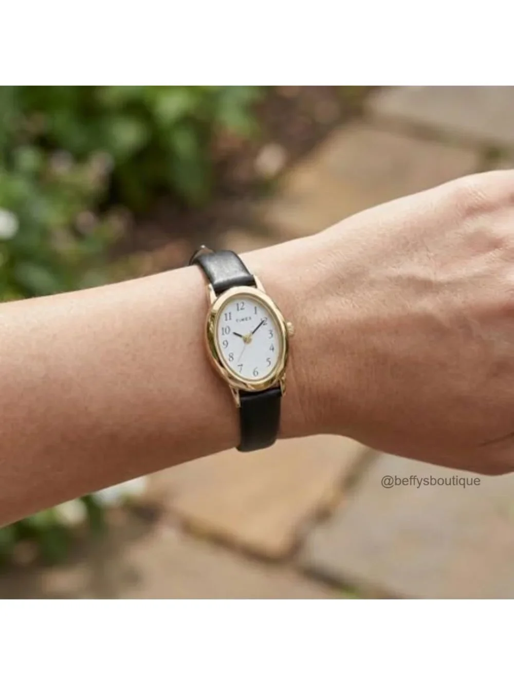 Women's Quartz Watch Leather Strap Gold-Tone Oval Case Arabic Numerals